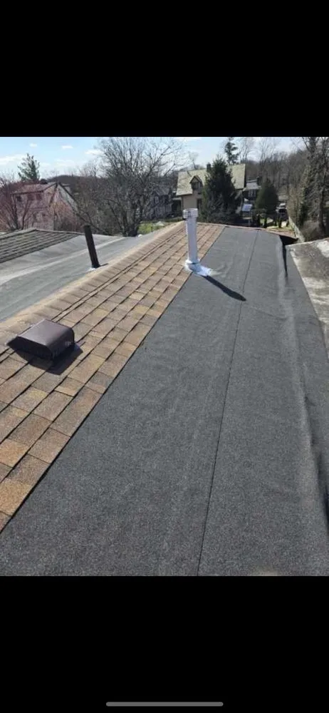 Slide of Janowitz Roofing