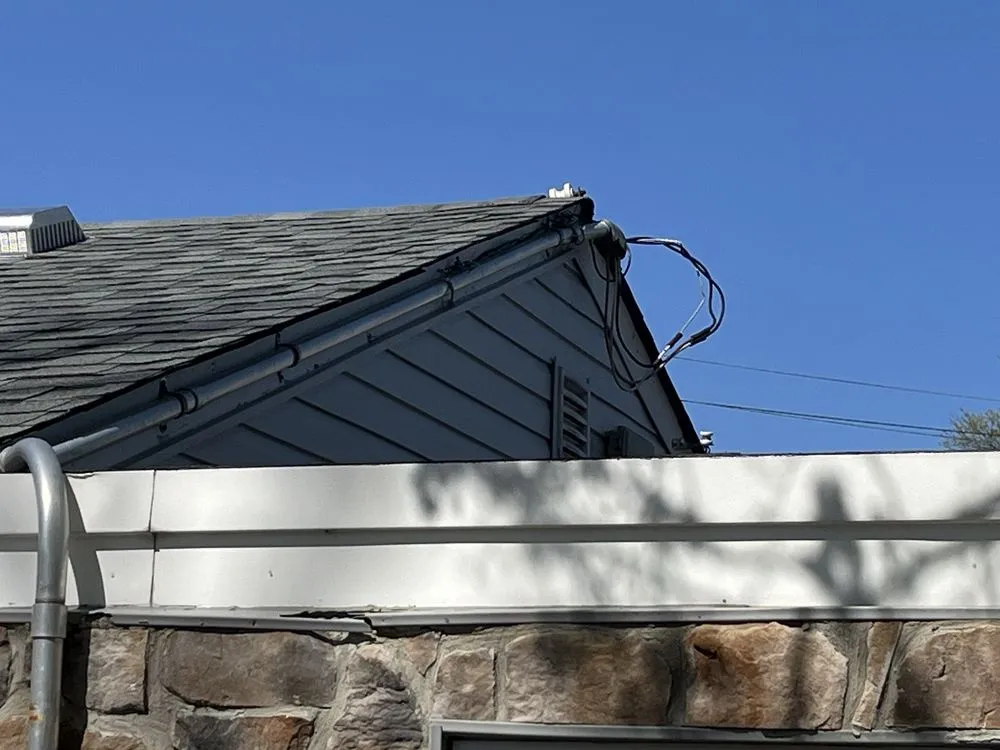 Slide of Janowitz Roofing