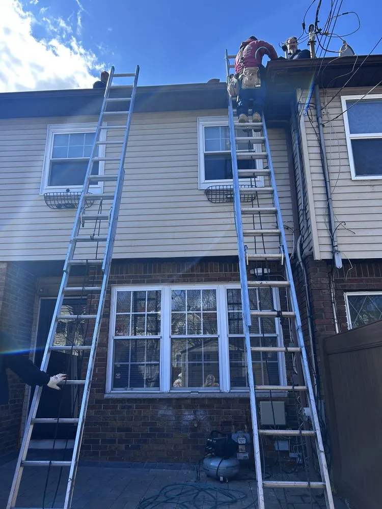 Slide of Janowitz Roofing