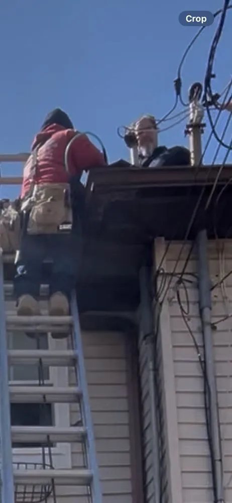 Slide of Janowitz Roofing