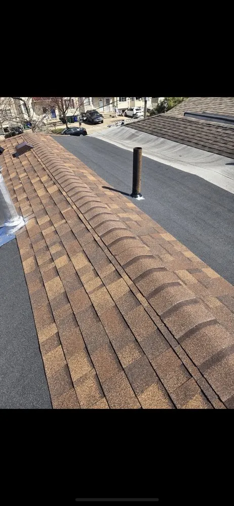 Slide of Janowitz Roofing