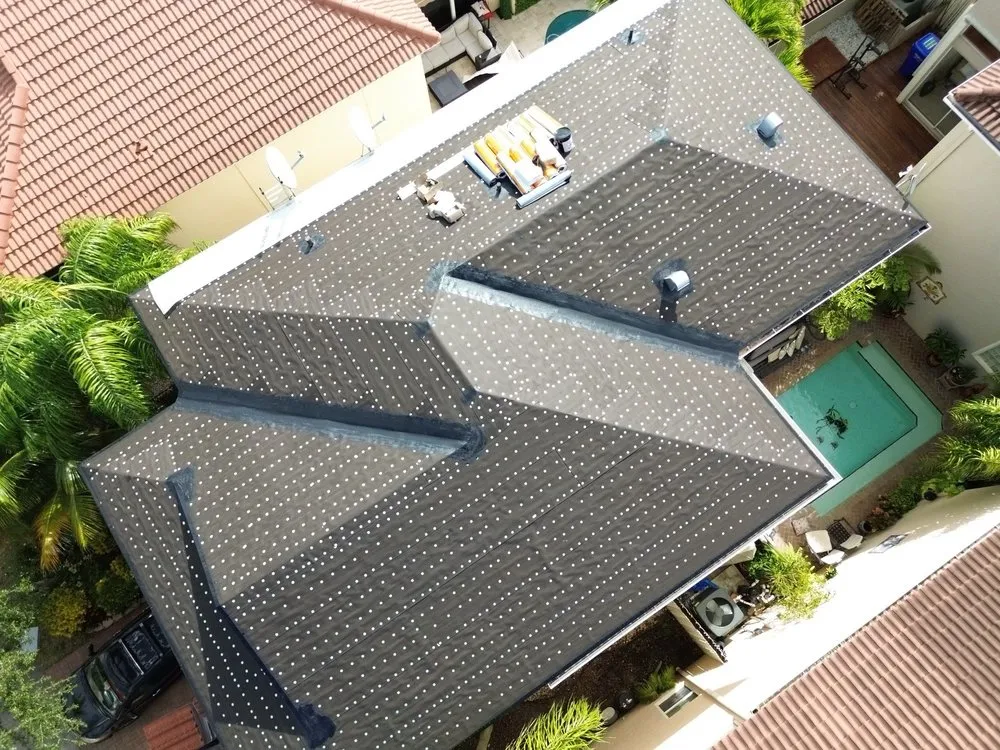 Slide of Janus Roofing