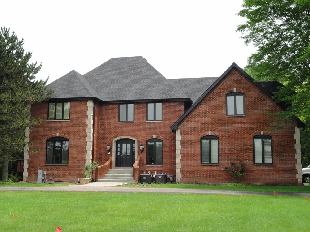 Professional flat roof repair after storm damage in St Charles, IL by Jarvis Exteriors