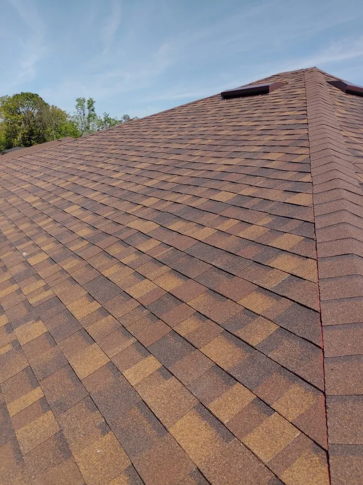 Slide of JAT Roofing