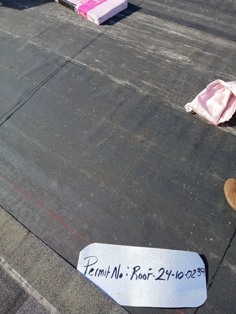 Slide of JAT Roofing