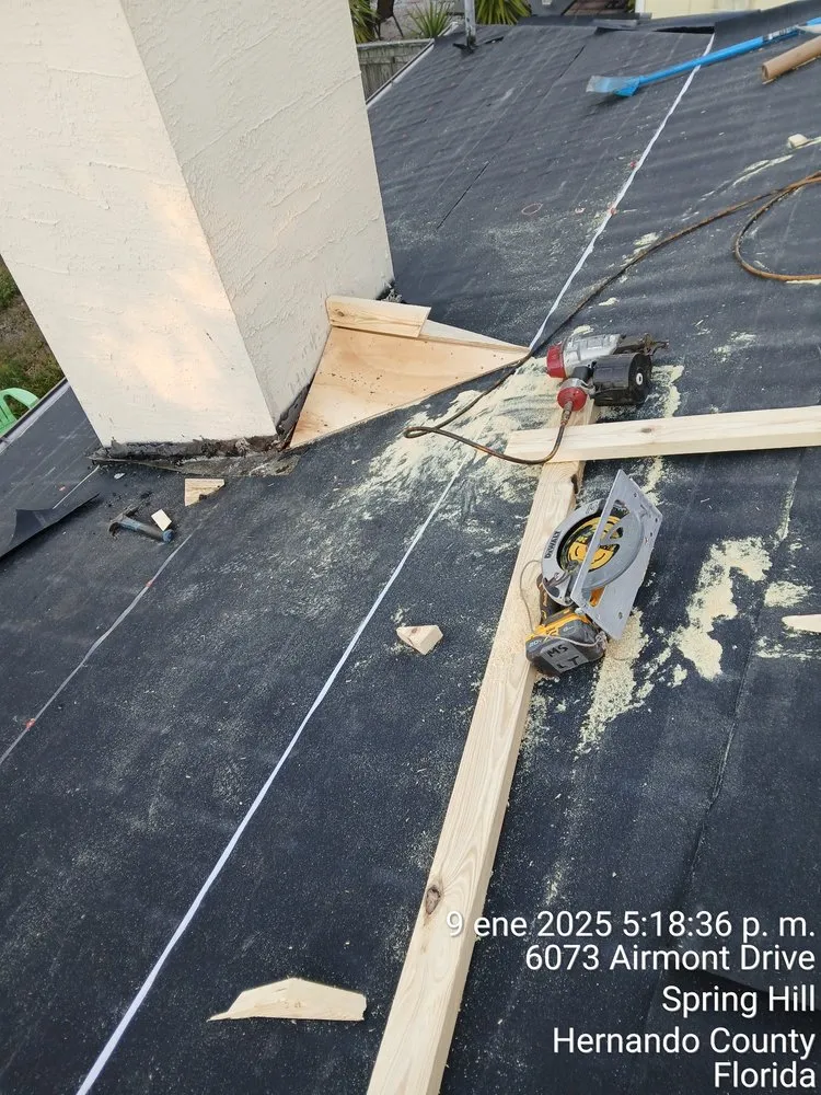 Slide of JAT Roofing