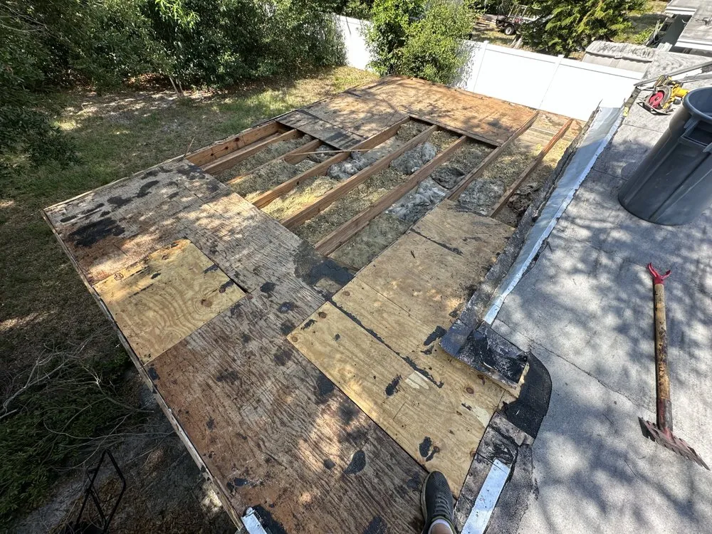 Slide of JAT Roofing