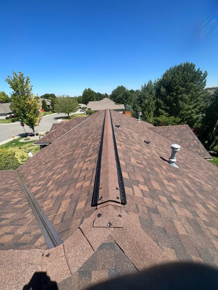 Slide of JAT Roofing