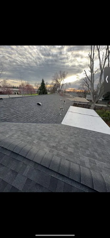 Slide of JAT Roofing