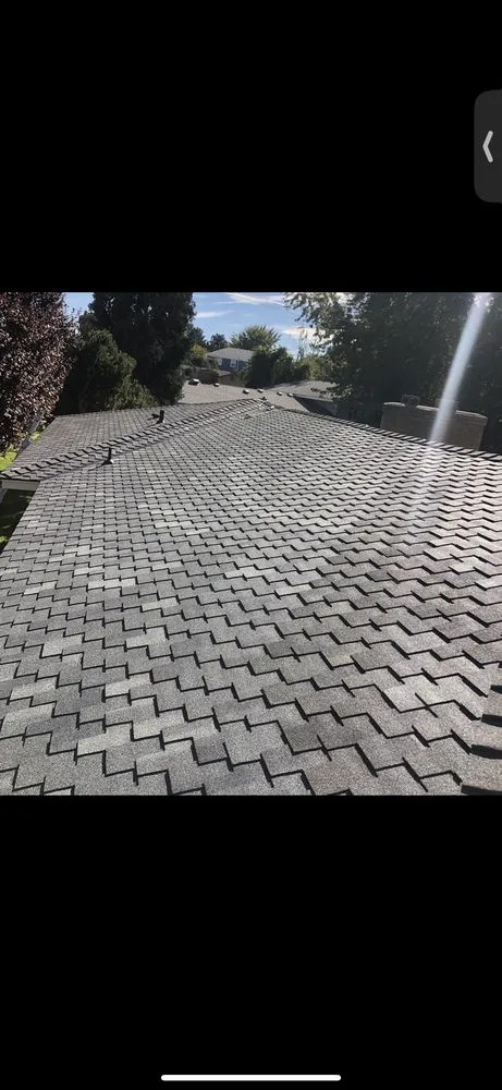 Slide of JAT Roofing