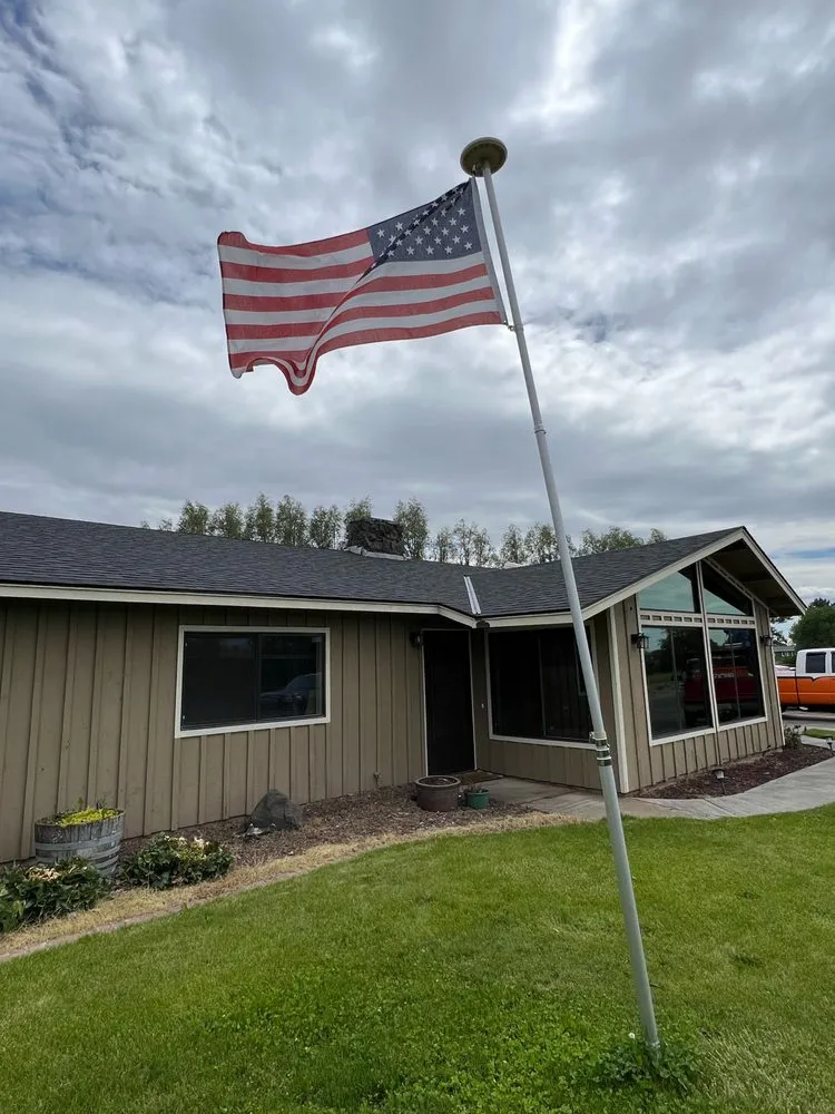 Slide of JAT Roofing