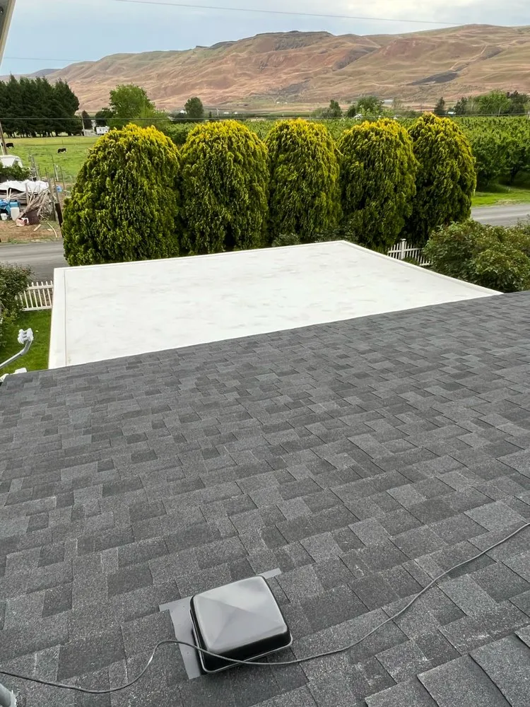 Slide of JAT Roofing