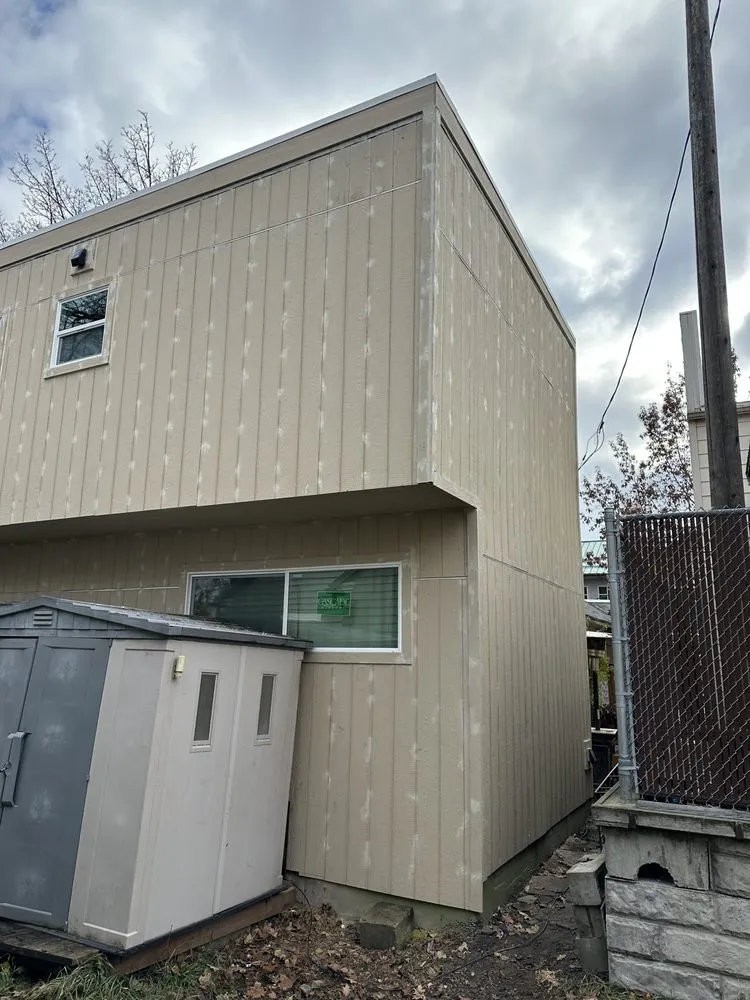 Slide of JAT Roofing