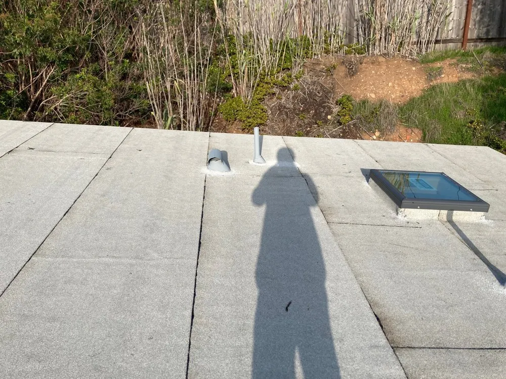 Slide of jauregui's roofing