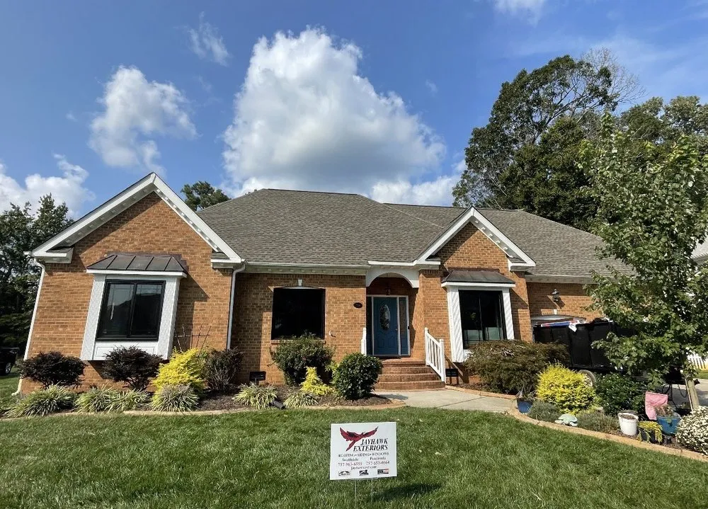 Slide of Jayhawk Exteriors