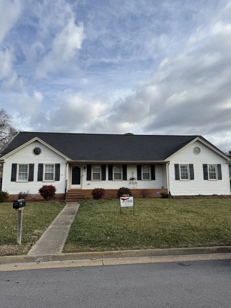 Slide of Jayhawk Exteriors