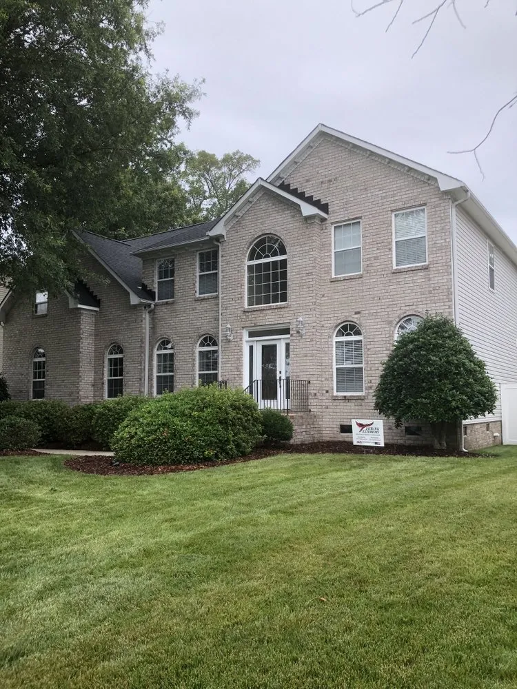 Slide of Jayhawk Exteriors-Peninsula