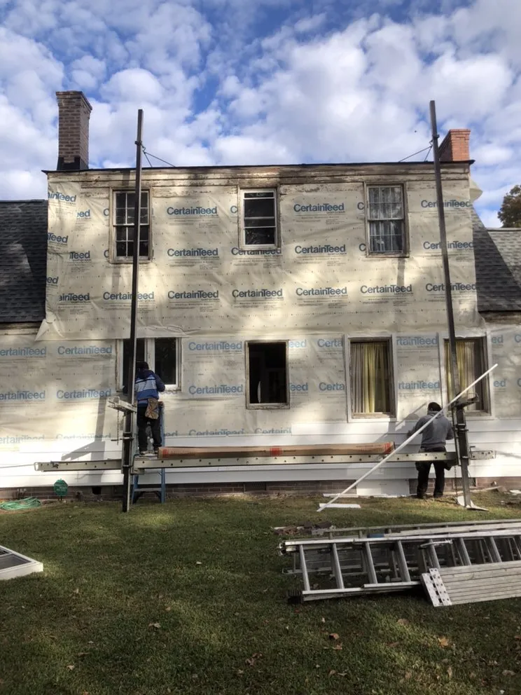 Slide of Jayhawk Exteriors-Peninsula