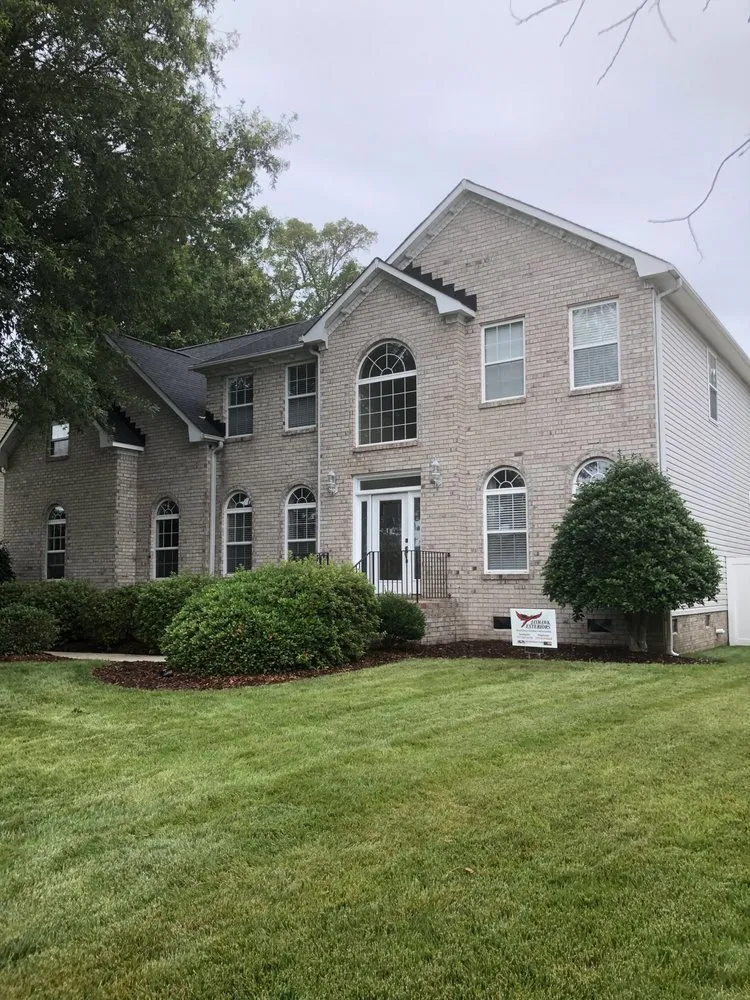 Slide of Jayhawk Exteriors-Peninsula