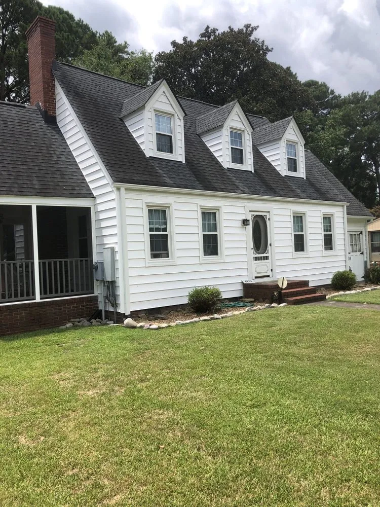 Slide of Jayhawk Exteriors-Peninsula