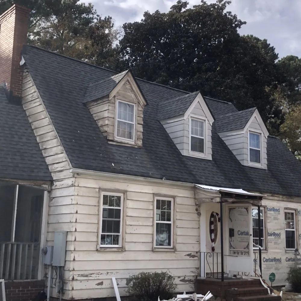 Slide of Jayhawk Exteriors-Peninsula