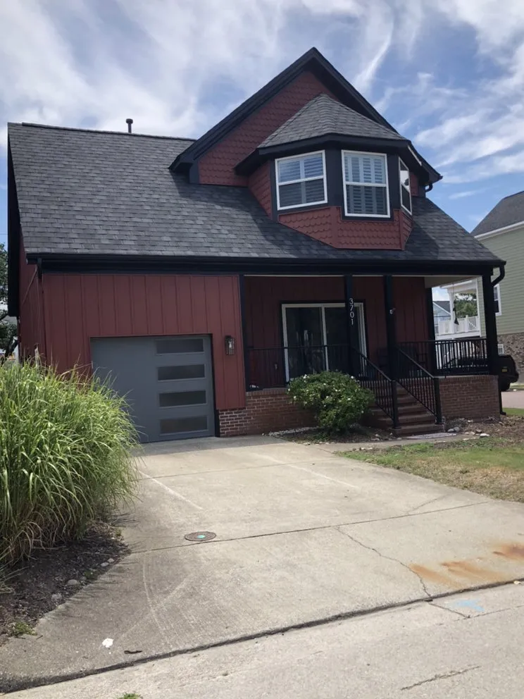 Slide of Jayhawk Exteriors-Peninsula