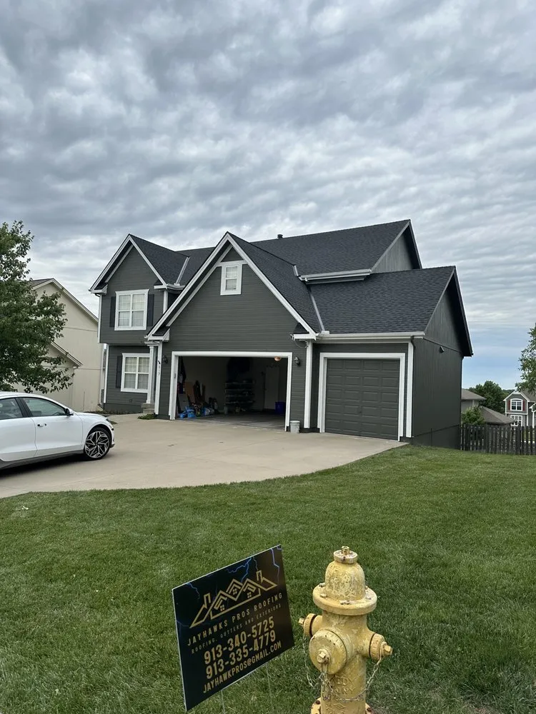 Slide of Jayhawk Roofing Pros