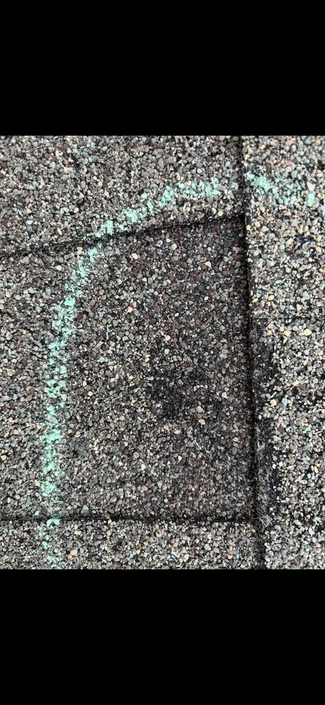 Slide of Jayhawk Roofing Pros