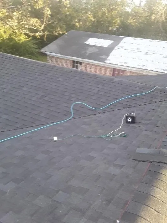 Slide of Jay’s Roofing & Land Clearing