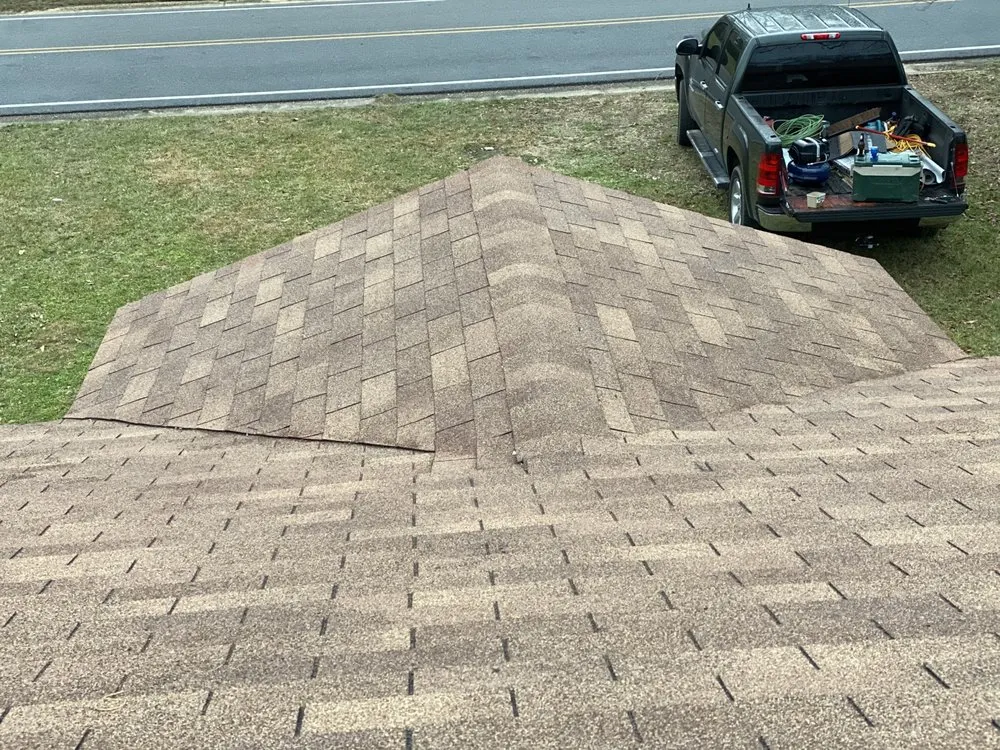 Slide of Jay’s Roofing & Land Clearing