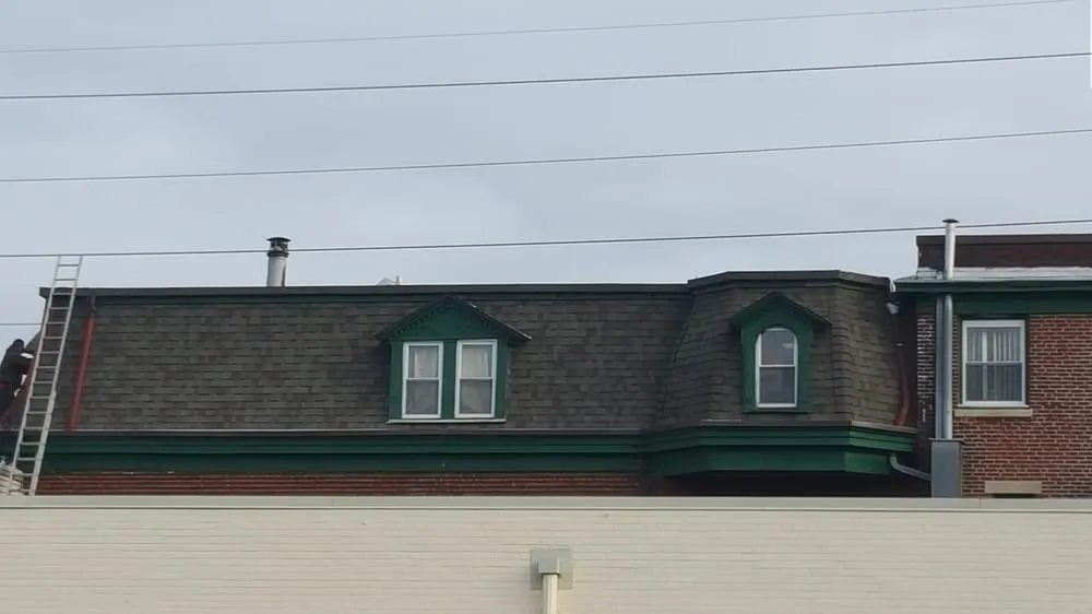 Slide of Jay's Roofing and Siding