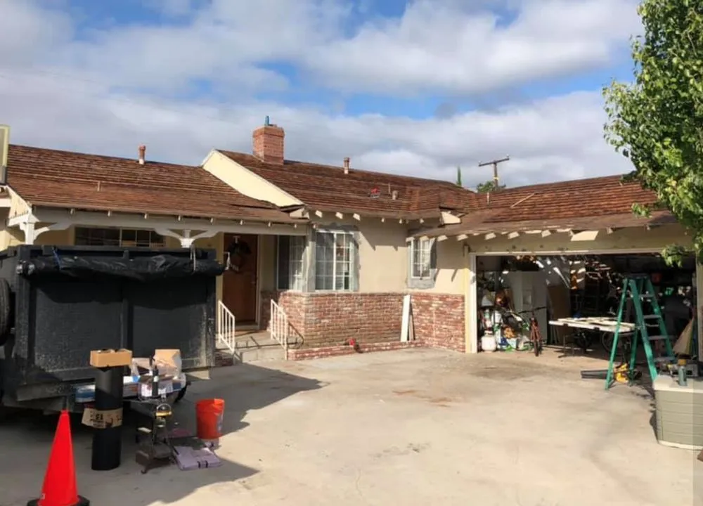 Slide of Jay's Roofing