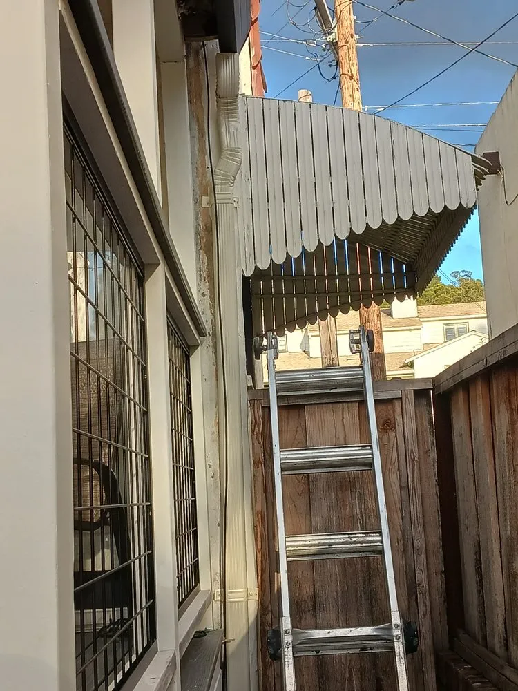 Slide of JB Rain Gutter installation