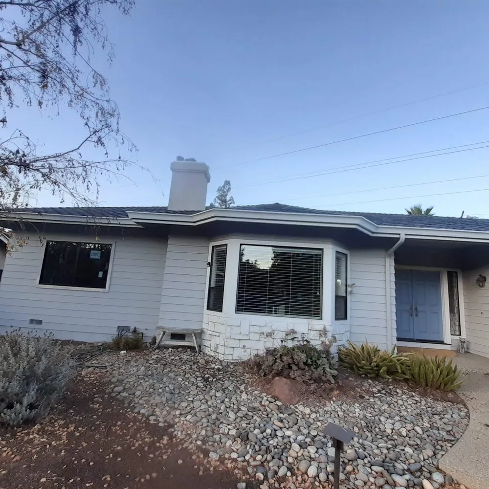 Slide of JB Rain Gutter installation