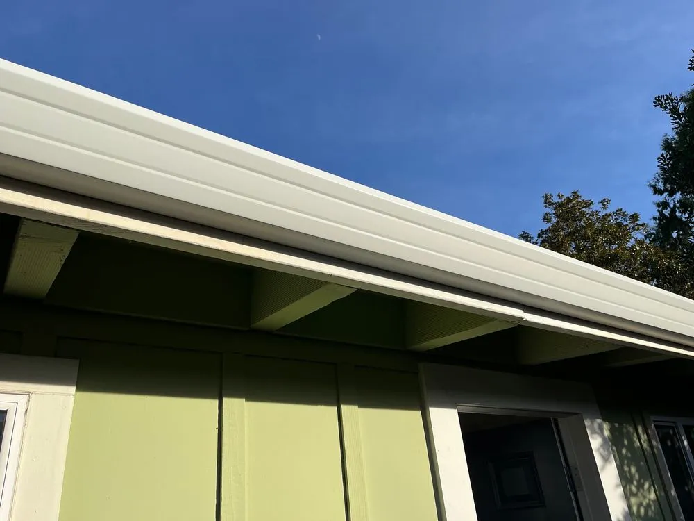 Slide of JB Rain Gutter installation