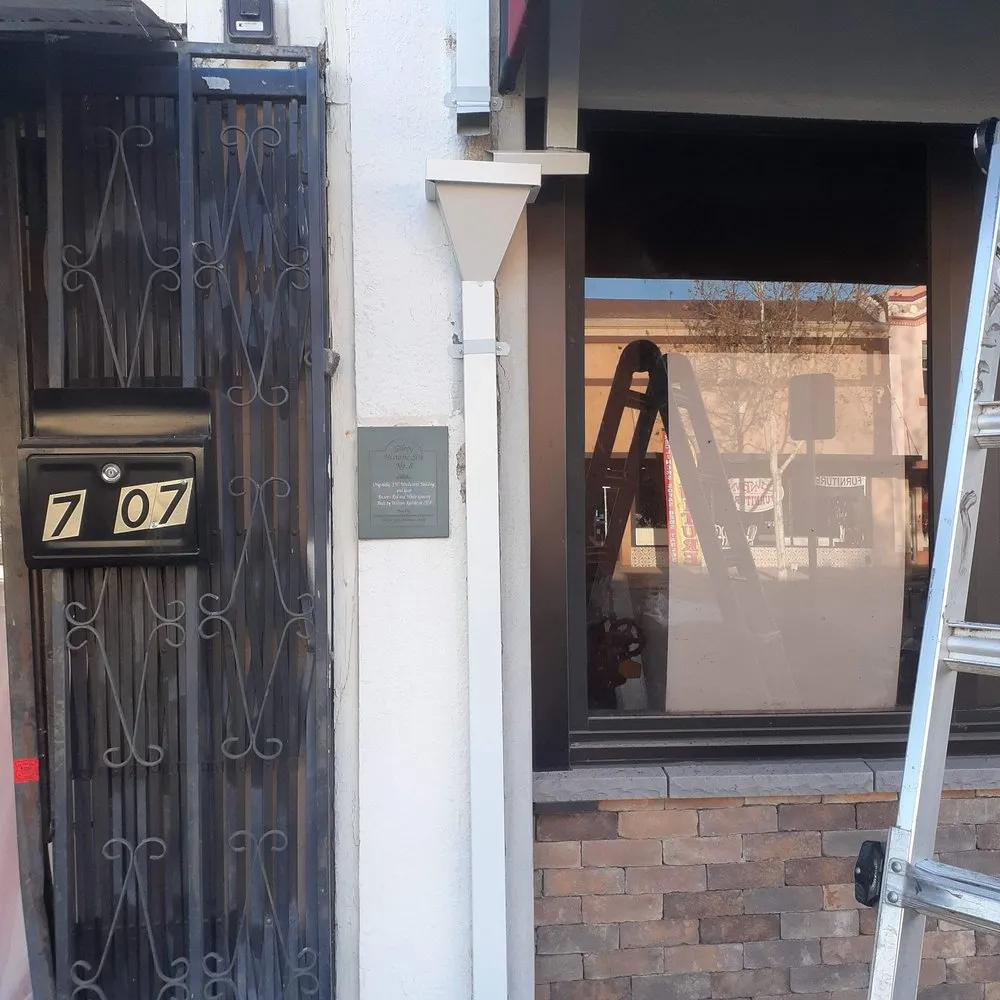 Slide of JB Rain Gutter installation