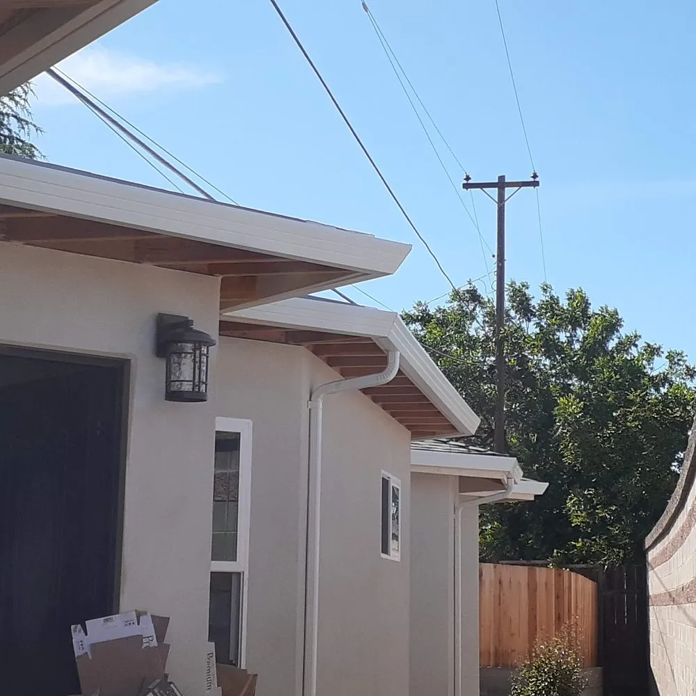 Slide of JB Rain Gutter installation