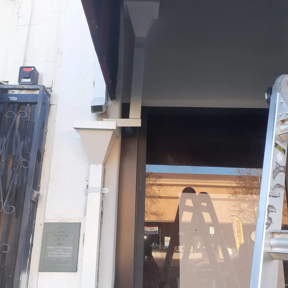 Slide of JB Rain Gutter installation