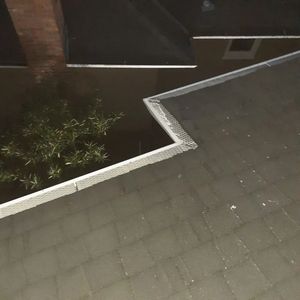 Slide of JB Rain Gutter installation