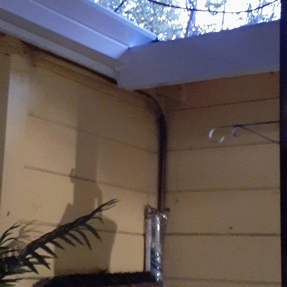 Slide of JB Rain Gutter installation