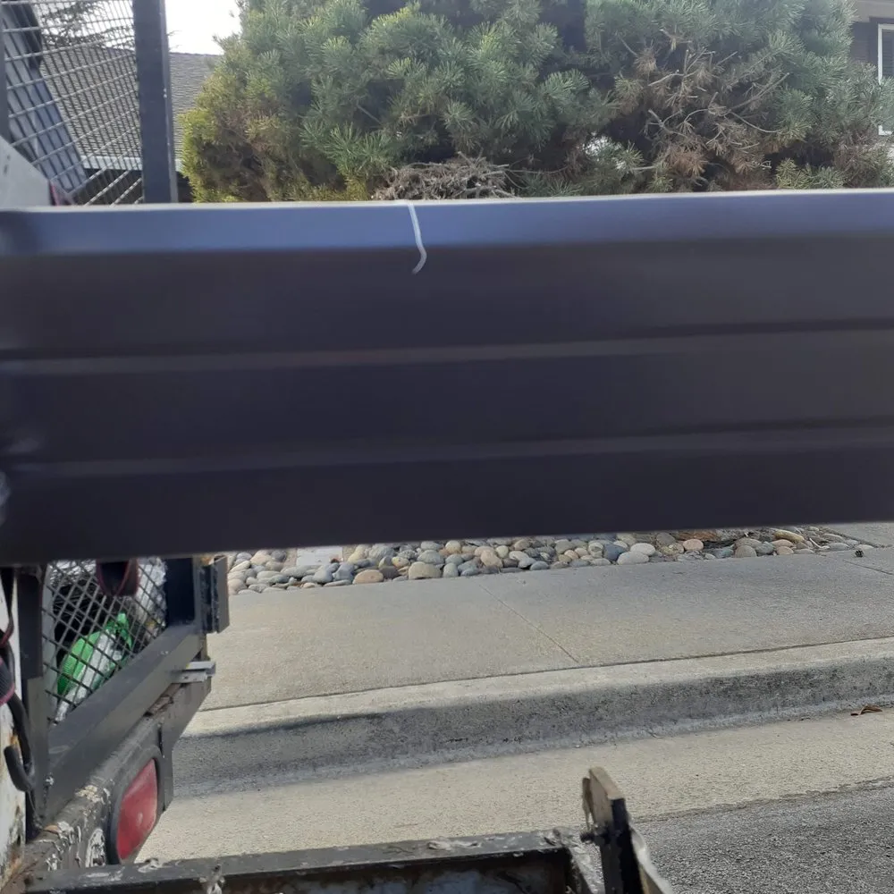 Slide of JB Rain Gutter installation