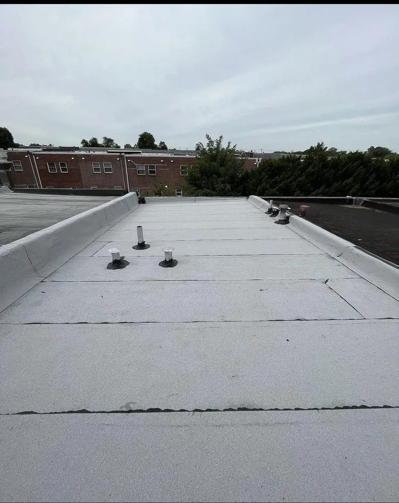 Slide of JBX Roofing