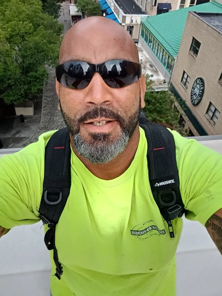 Slide of JC Flatroofs