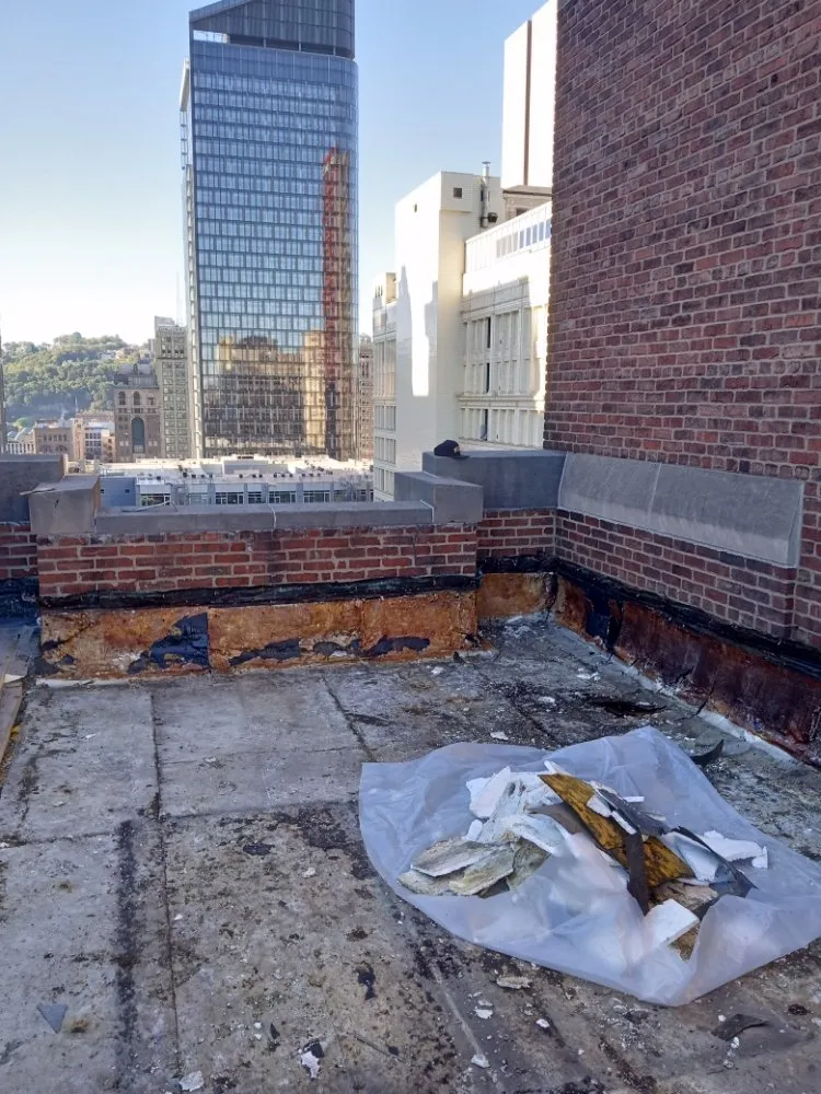 Slide of JC Flatroofs