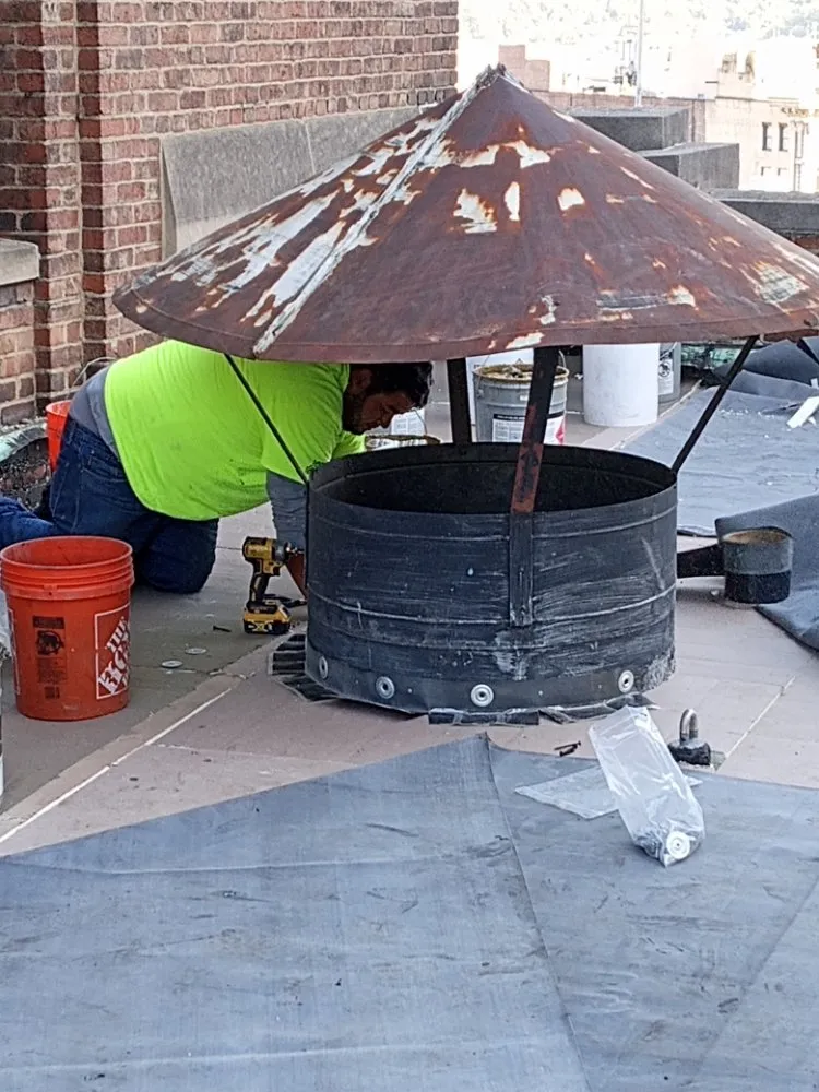 Slide of JC Flatroofs