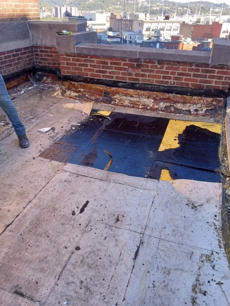 Slide of JC Flatroofs