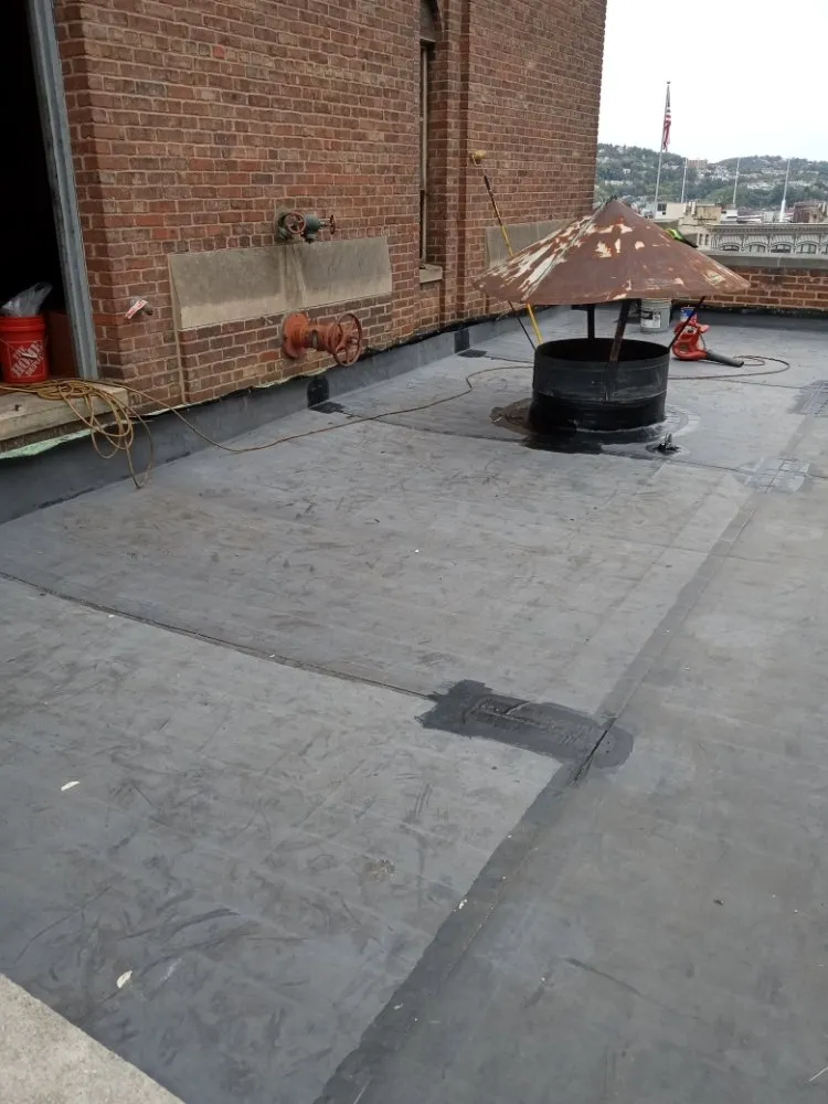 Slide of JC Flatroofs