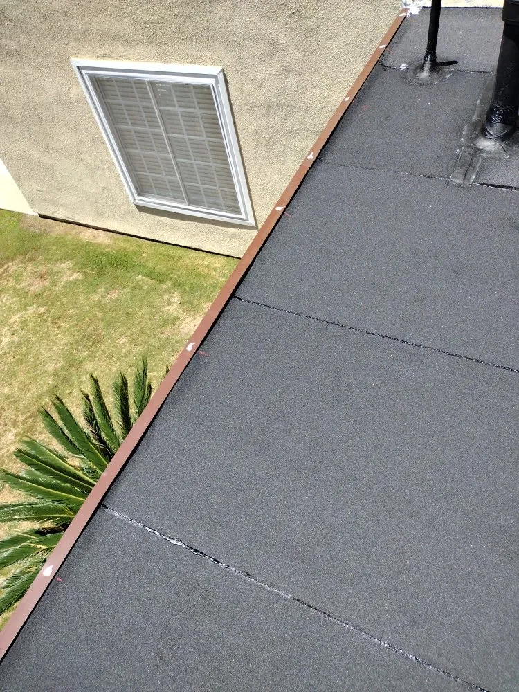 Slide of J&C López Roofing