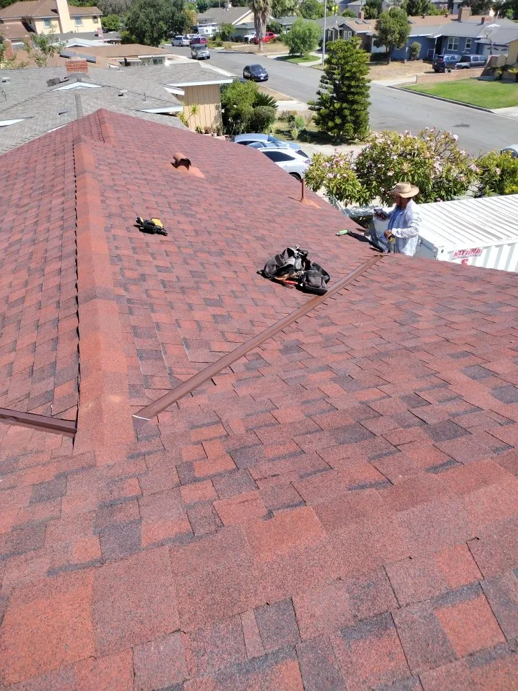 Slide of J&C López Roofing