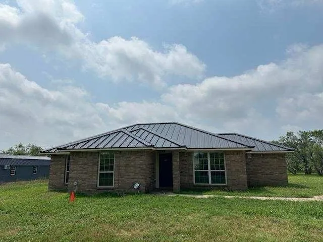 Slide of JC Metal Roofing Denton